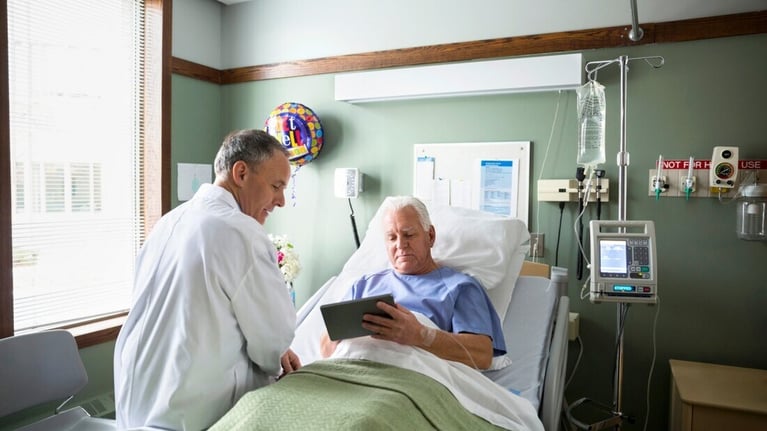 doctor and patient using tablet pc 0