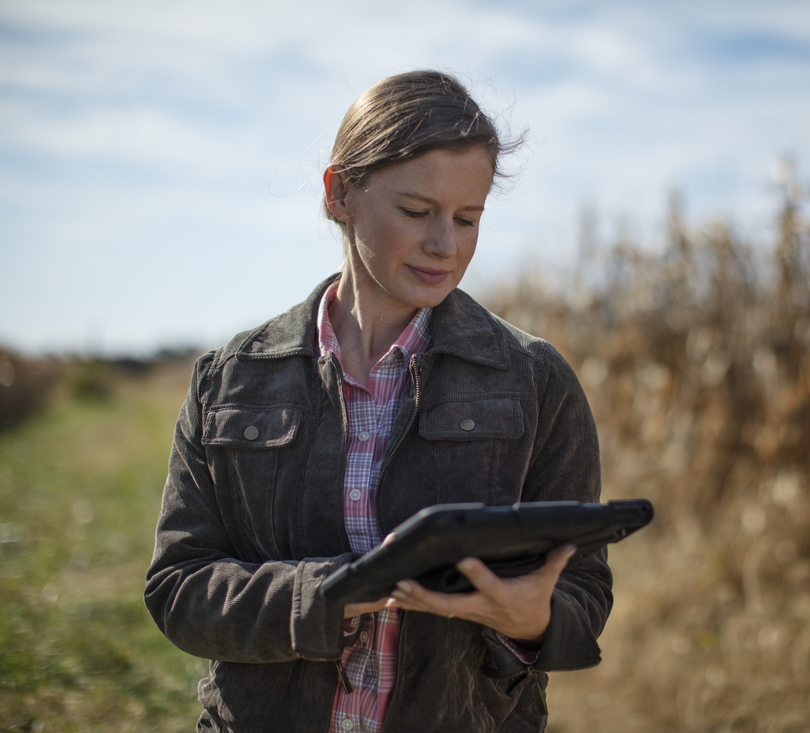 farmer_reviewing_data_in_a_cornfield_3.jpg