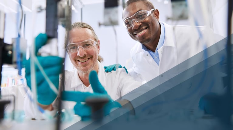 two smiling scientists