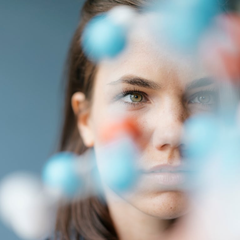 scientist studying molecule model