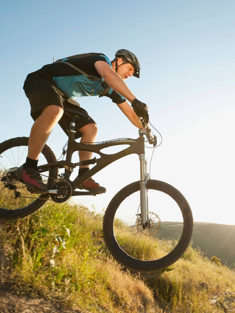 Mountainbiker_rides_downhill_3.jpg