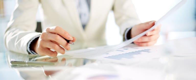 businesswoman-working-with-papers.jpg
