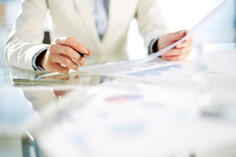 businesswoman-working-with-papers.jpg