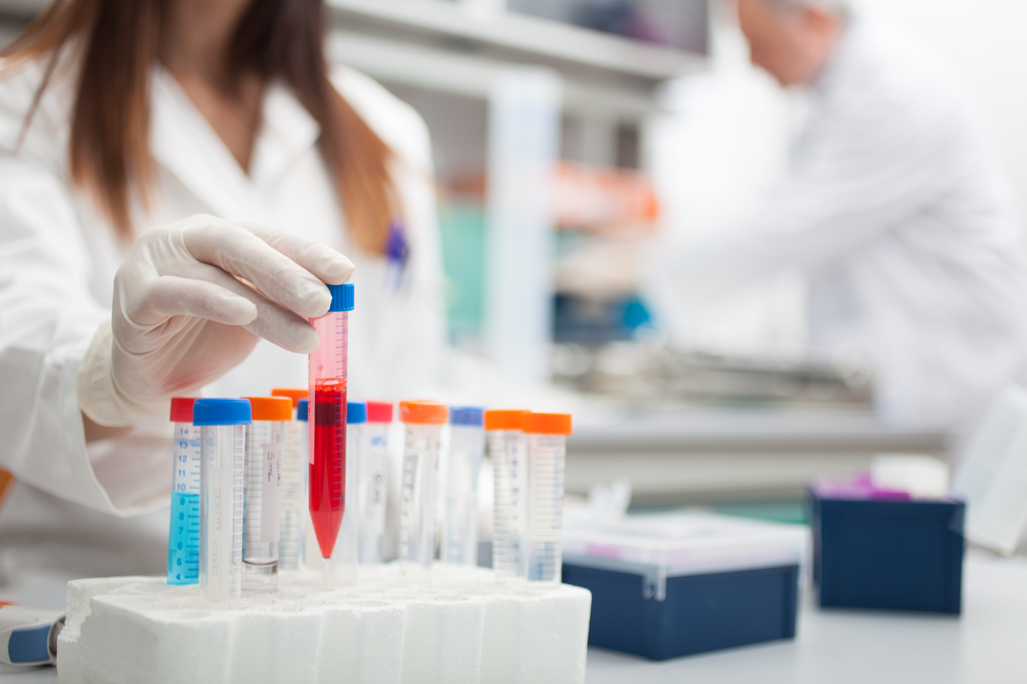 researcher_with_test_tubes.jpg