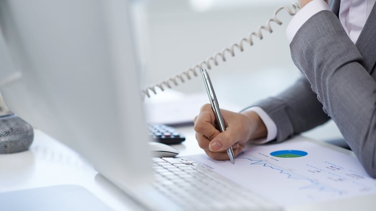header phoning man making notes 0