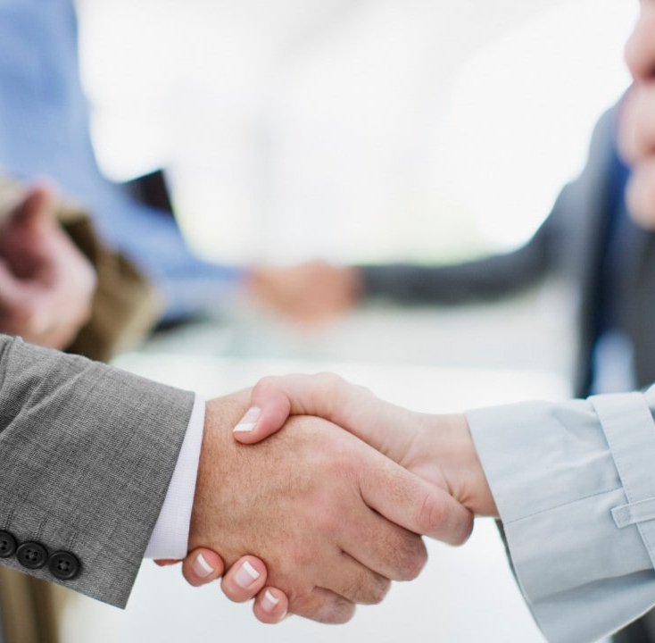 Businesspeople shake hands 1280X720