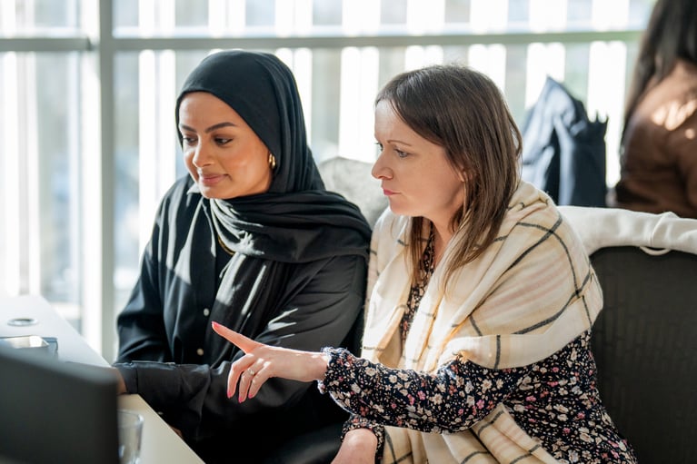 Two-women-looking-at-laptop.jpg