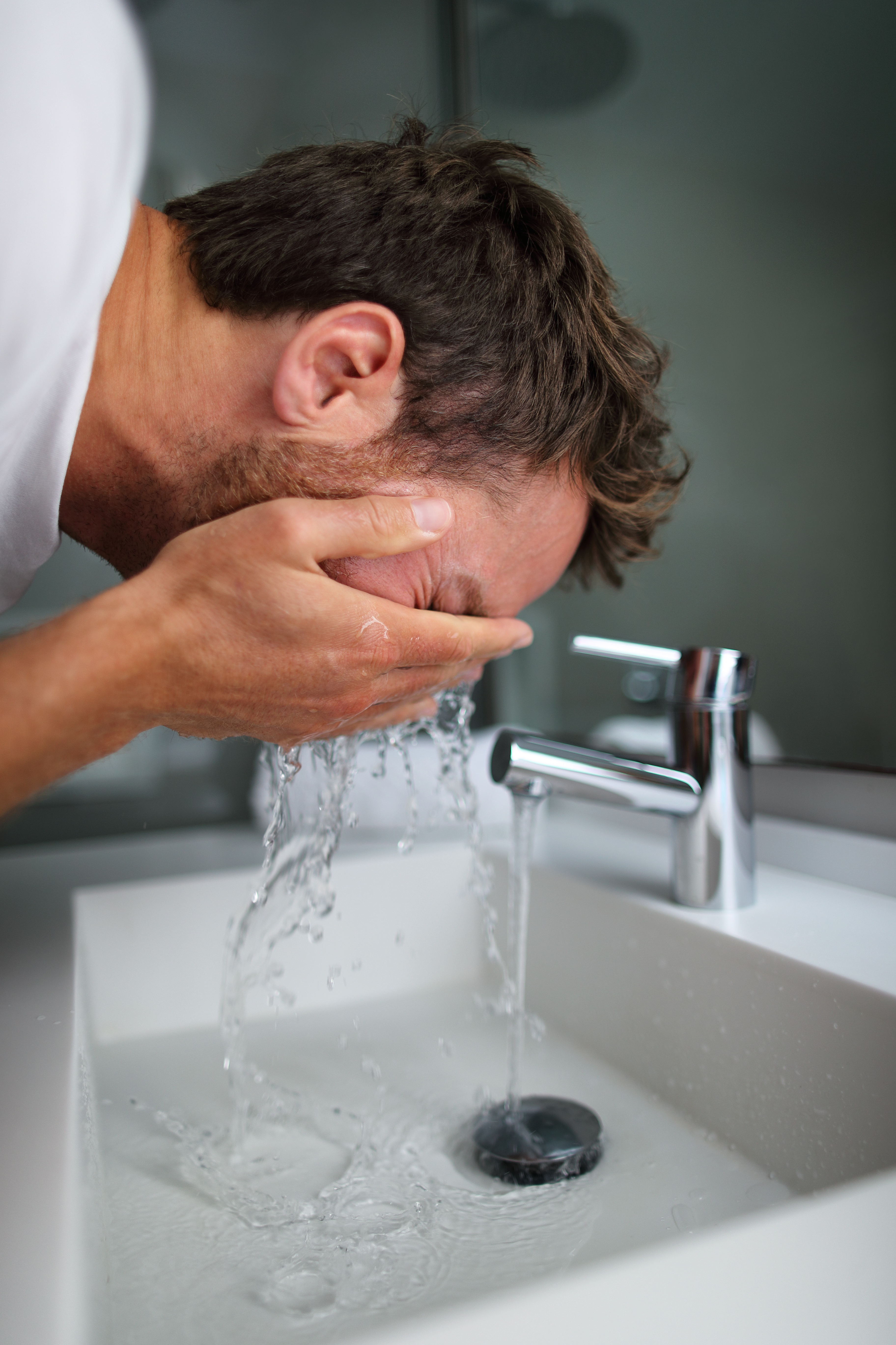 man-washing-face.jpeg
