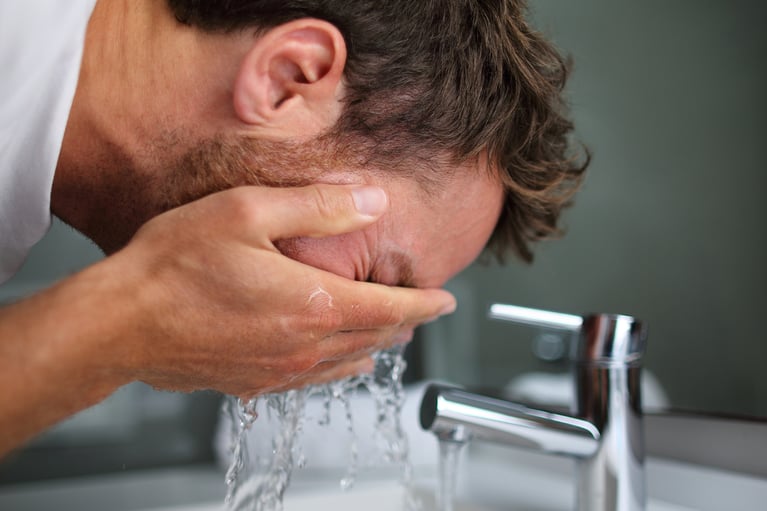 man-washing-face.jpeg