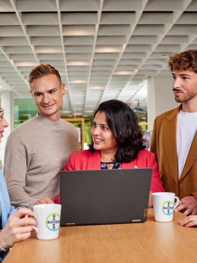 bayer-employees-discussing-4.jpg