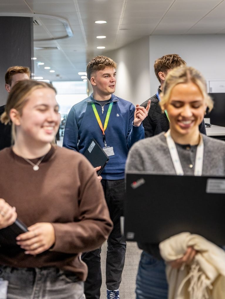 Apprentices walking in the office.jpg