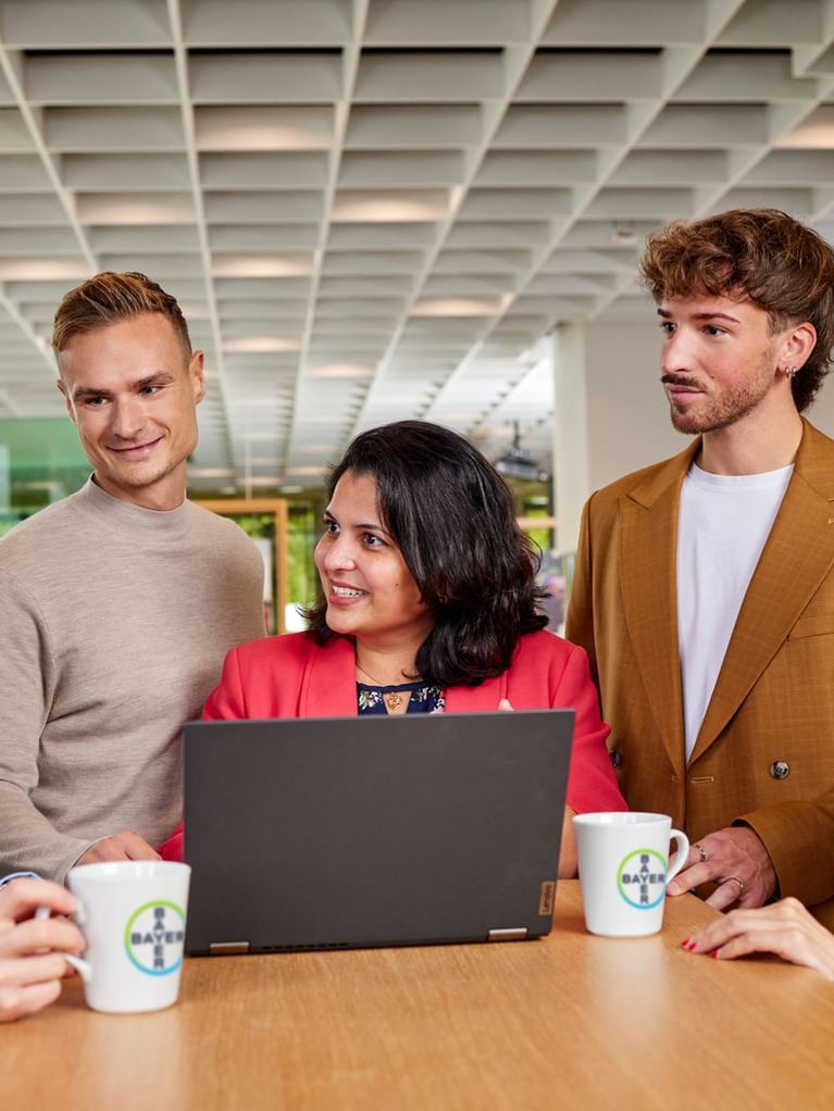 bayer-employees-discussing-4.jpg