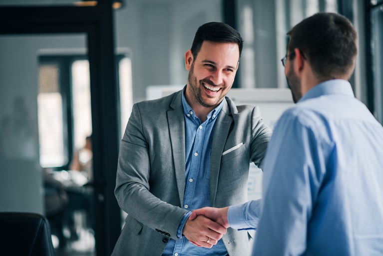 businessmen_shaking_hands.jpeg