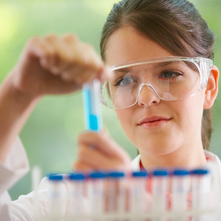 examining_tubes_with_chemicals.jpg