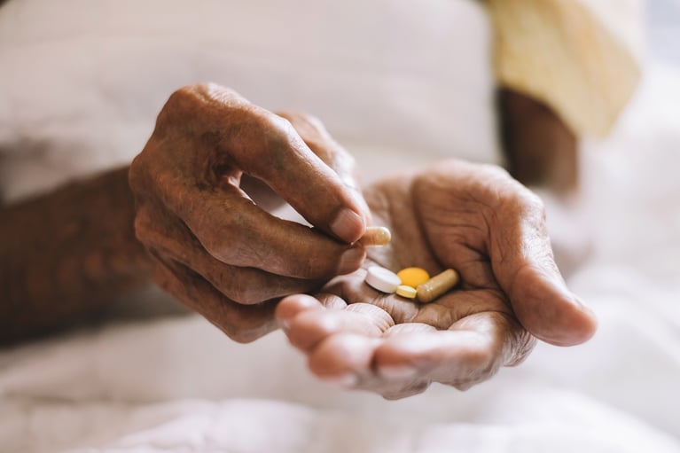 pills_in_a_seniors_hand.jpeg