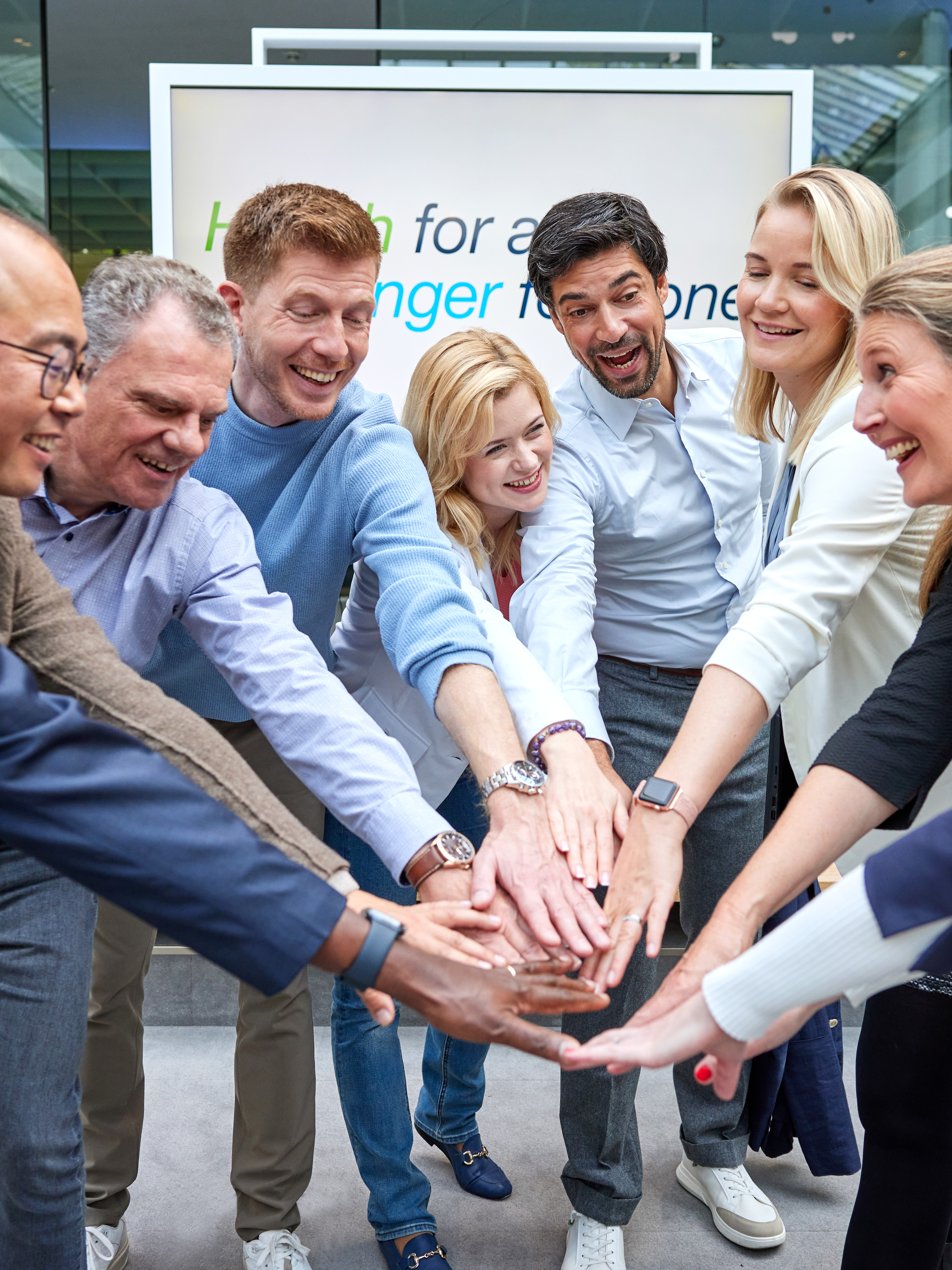 employees-put-their-hands-together-2.jpg