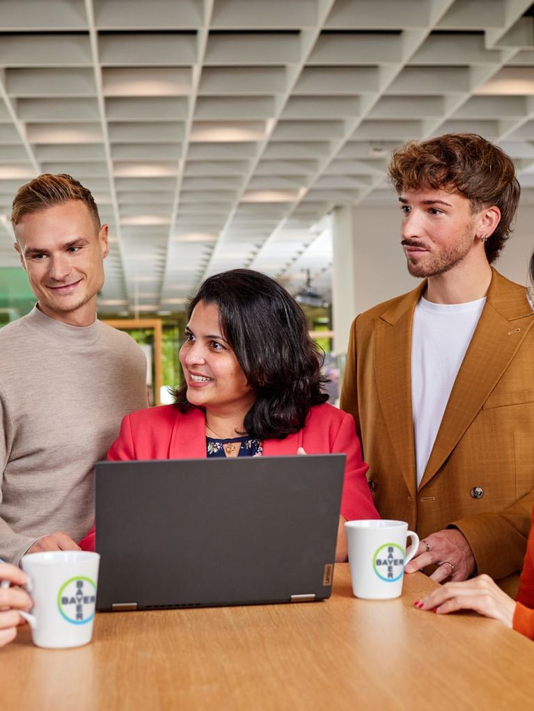 bayer-employees-discussing-4.jpg
