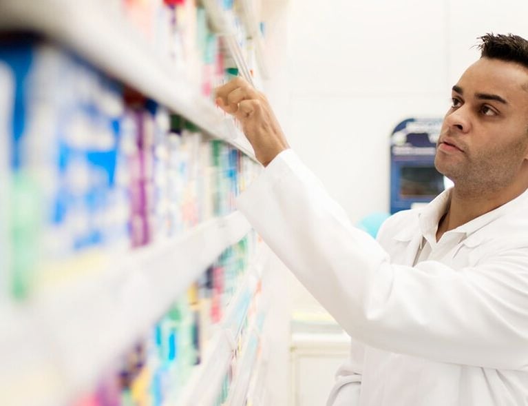 Pharmacists in a pharmacy 1440x590