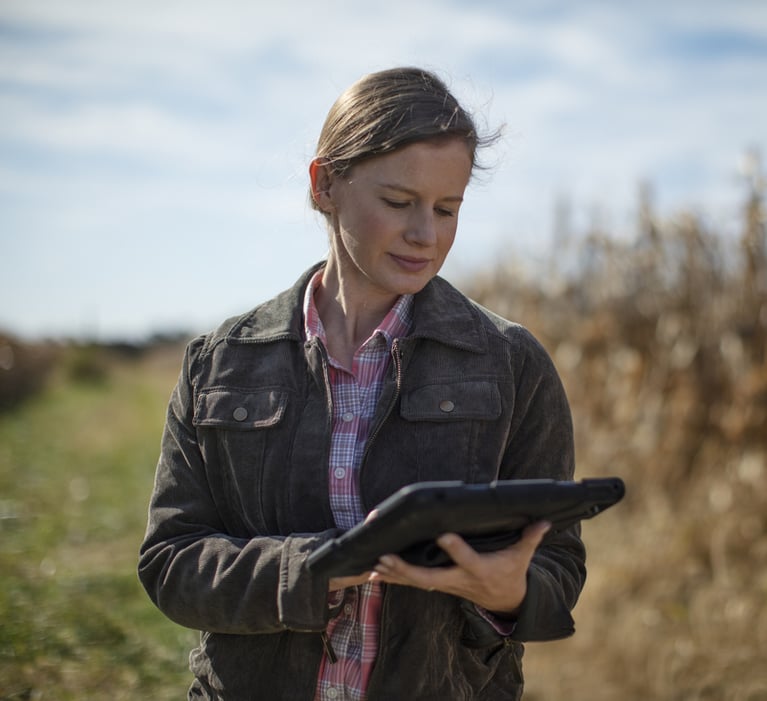 farmer_reviewing_data_in_a_cornfield_3.jpg