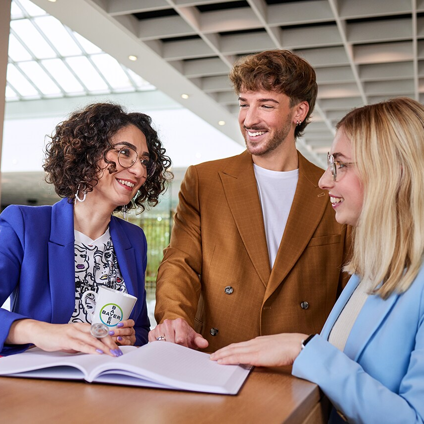 bayer employees discussing 6