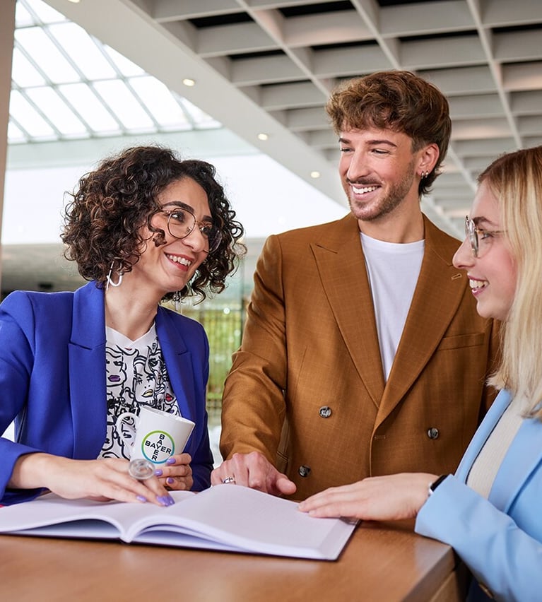 bayer employees discussing 6