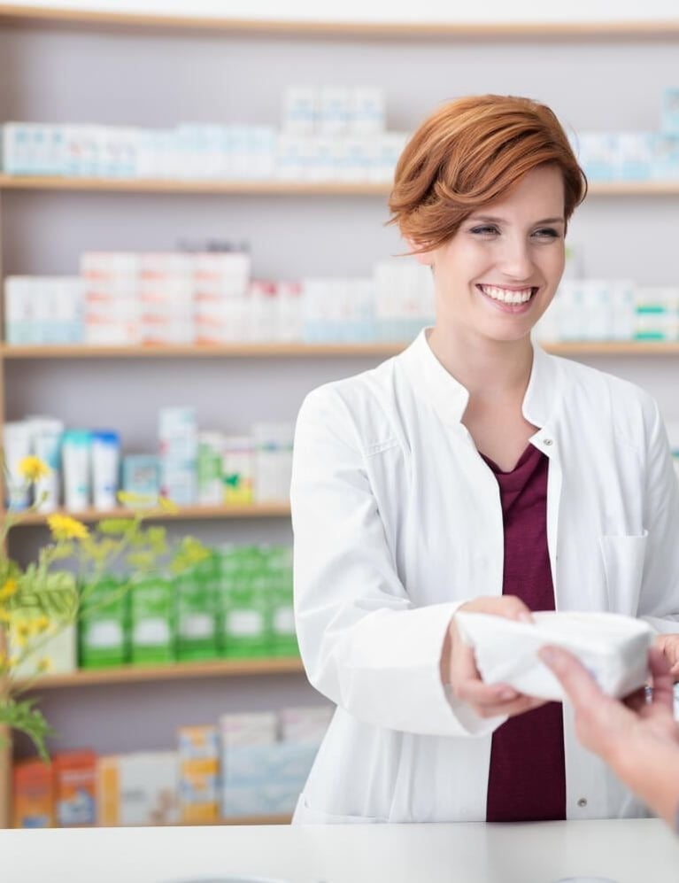 pharmacist-passing-medicine