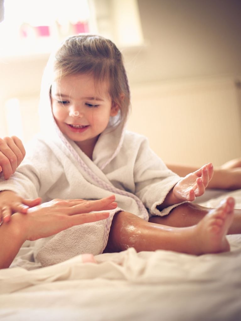 mother_and_daughter_applying_body_lotion.jpg
