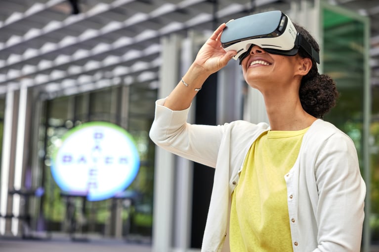 bayer-employee-with-vr-goggles-1.jpg
