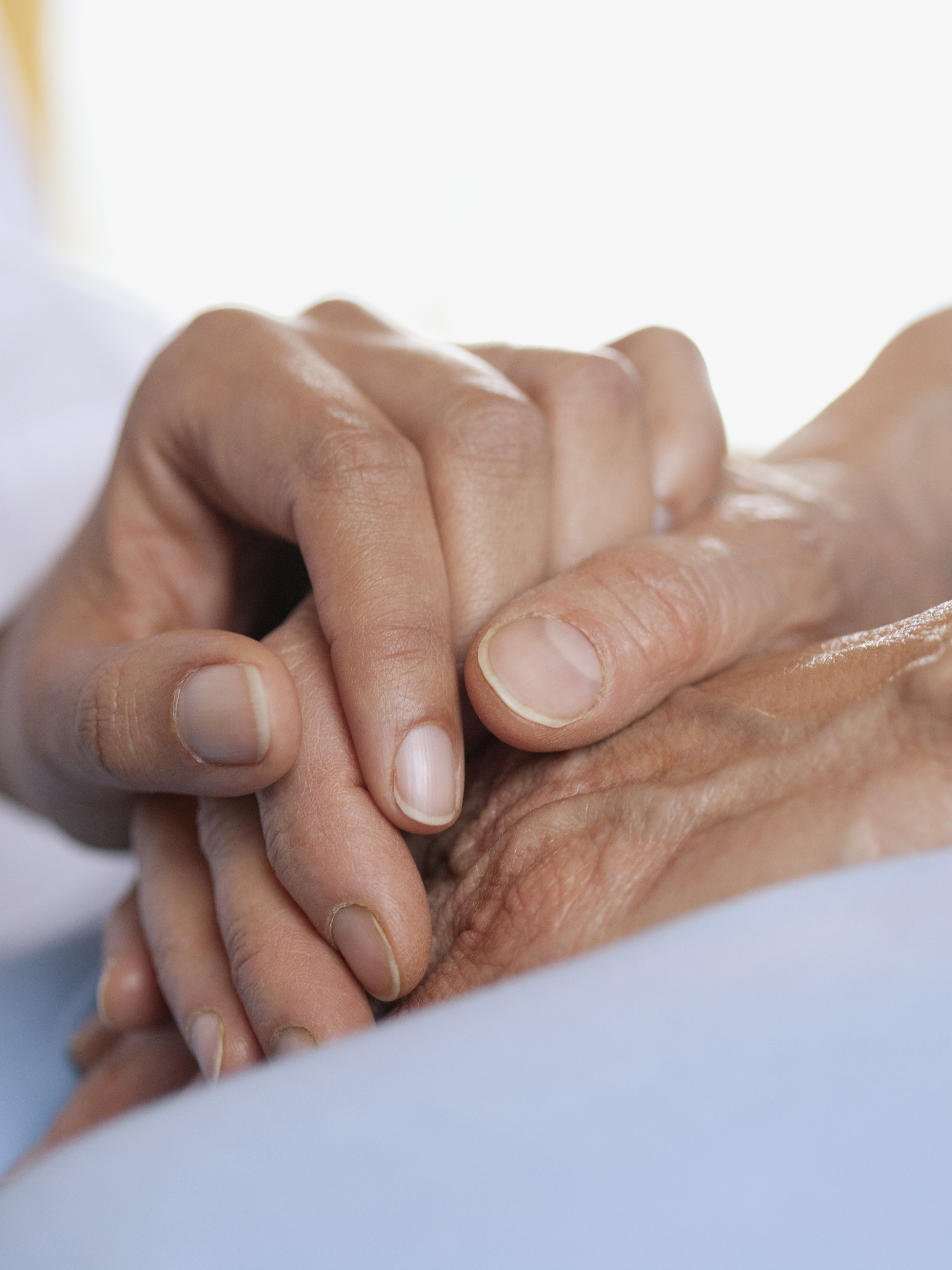 doctor_holding_patients_hand.jpg