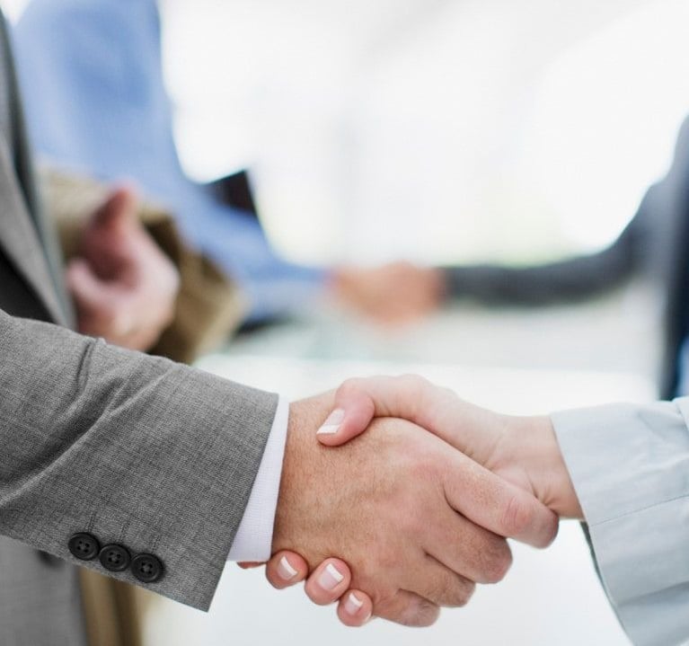 Businesspeople shake hands 1280X720