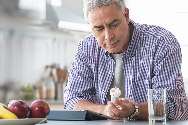 patient reading prescription