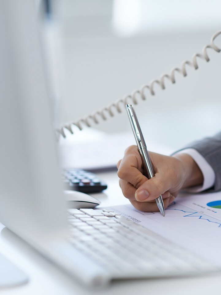 header phoning man making notes 0