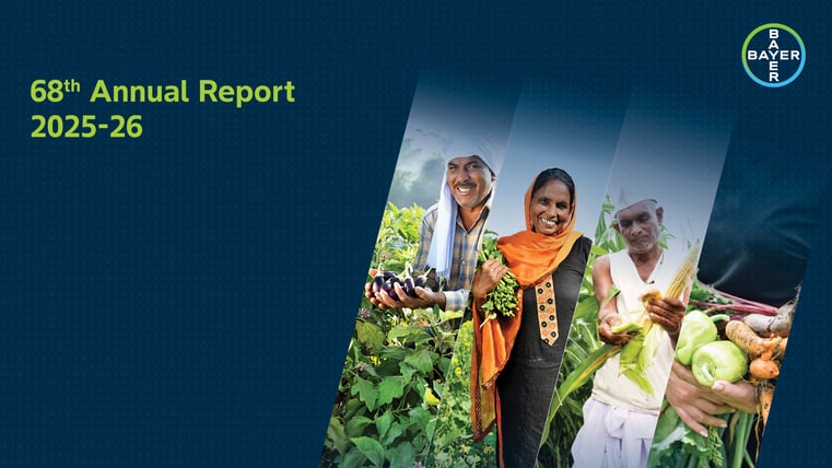 Cover of the 68th Annual Report for 2025-26 featuring smiling farmers holding produce on a blue dotted background with Bayer logo