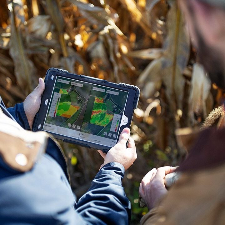 plant-experts-reviewing-data-cornfield-1280x720.jpg