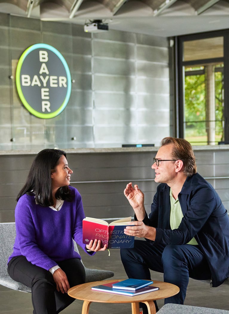 employees-in-front-of-a-bayer-cross-2.jpg