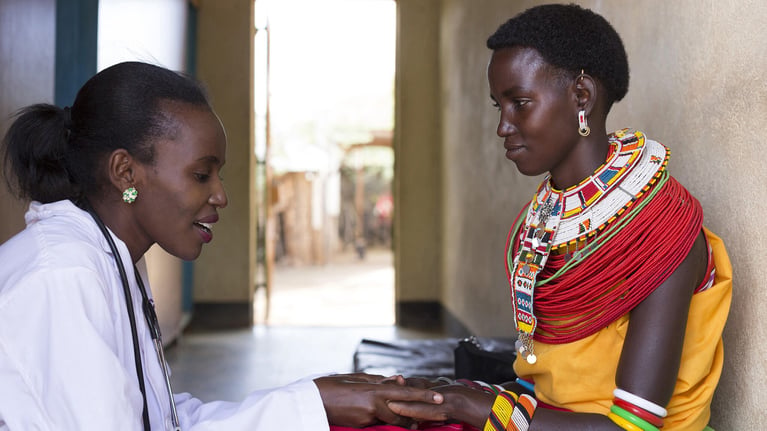 african_doctor_with_patient-1.jpg