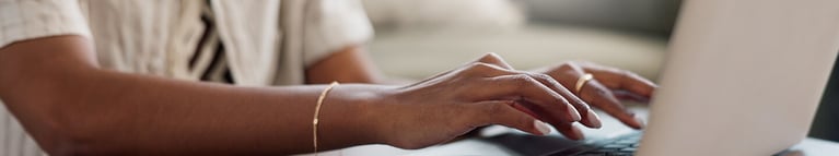 hand-and-laptop-1440x270.jpg