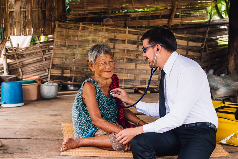 male_doctor_examining_asian_woman.jpeg