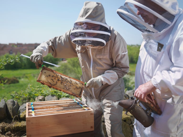 beekeepers_with_honeycomb.jpg