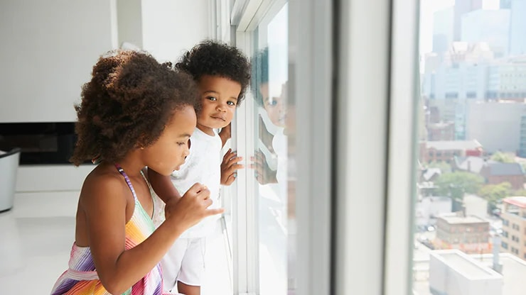 Young children illustrating how environmental and microbial exposure during early life may influence immune system development and susceptibility to allergies.