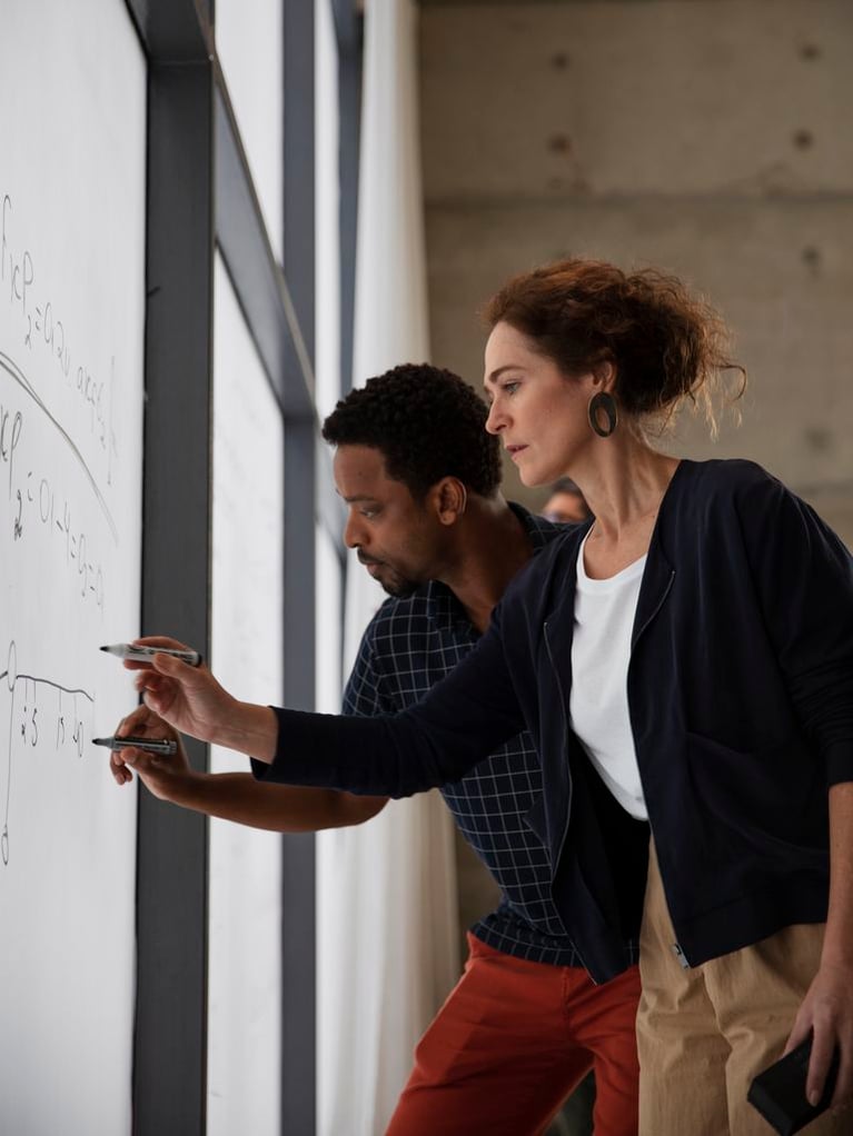 researchers_working_at_a_whiteboard_4.jpg