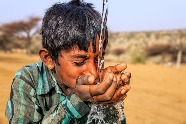 child_drinking_fresh_water_5.jpg