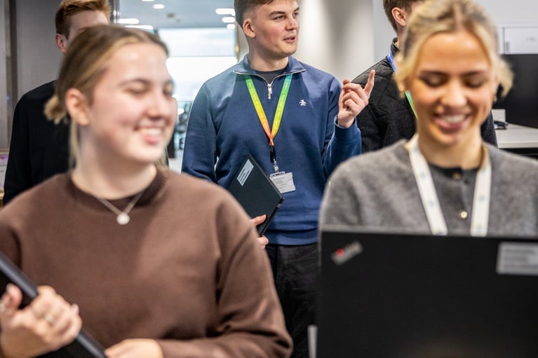 Apprentices walking in the office.jpg
