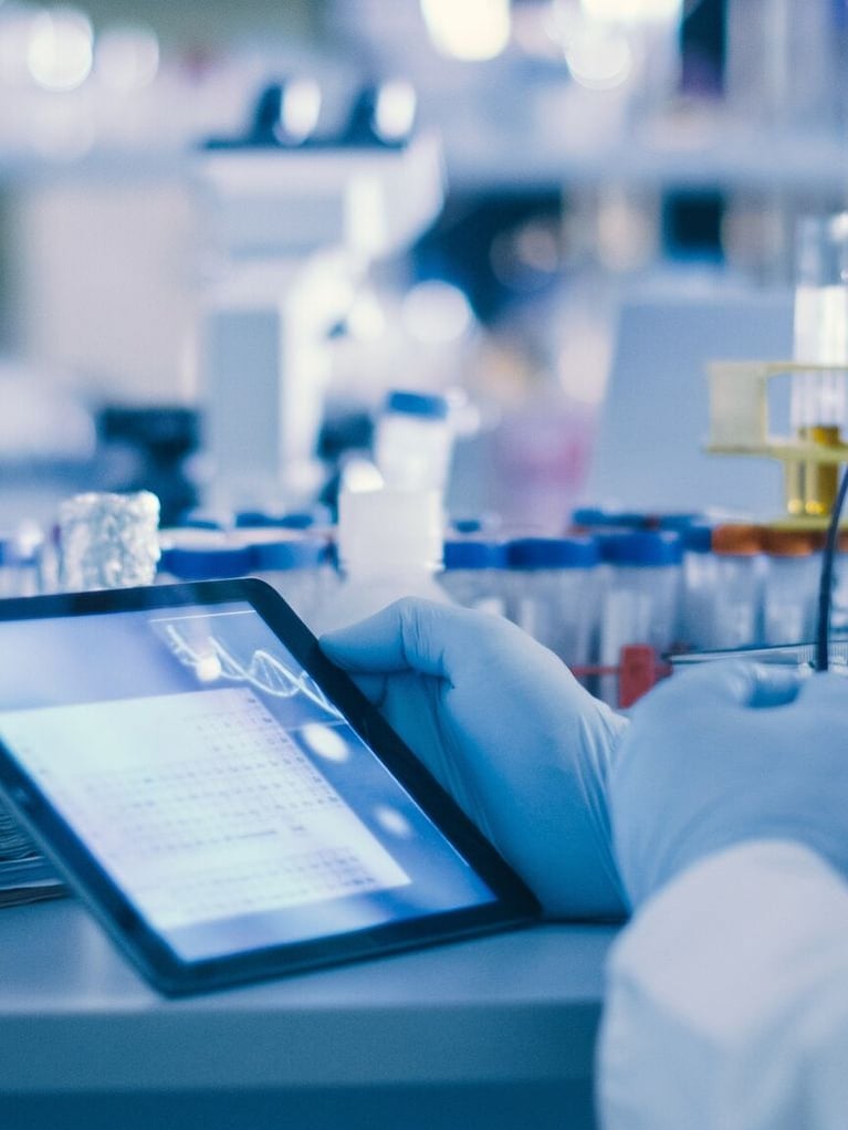 photo research scientist using tablet