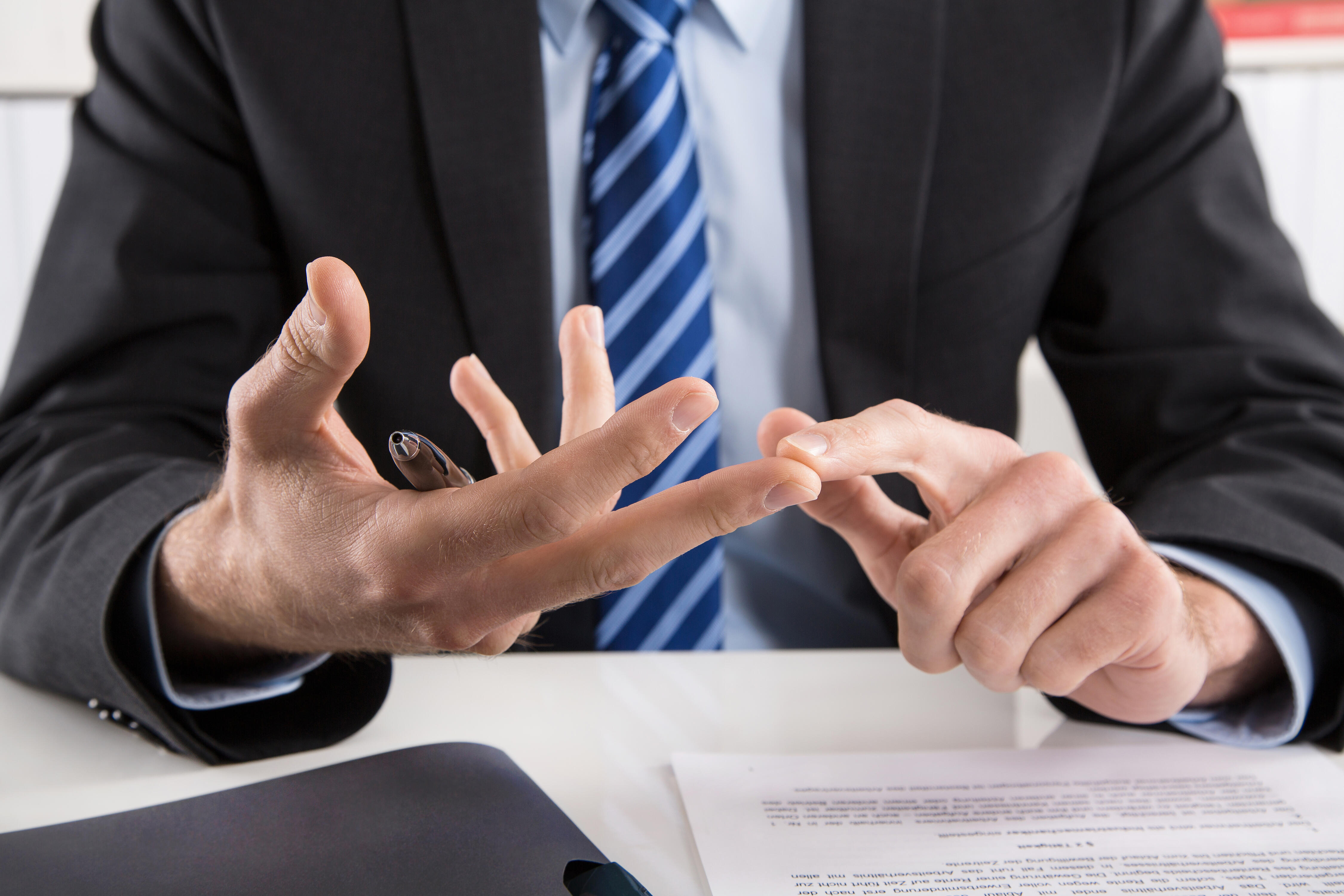 businessman_counting_with_fingers.jpg