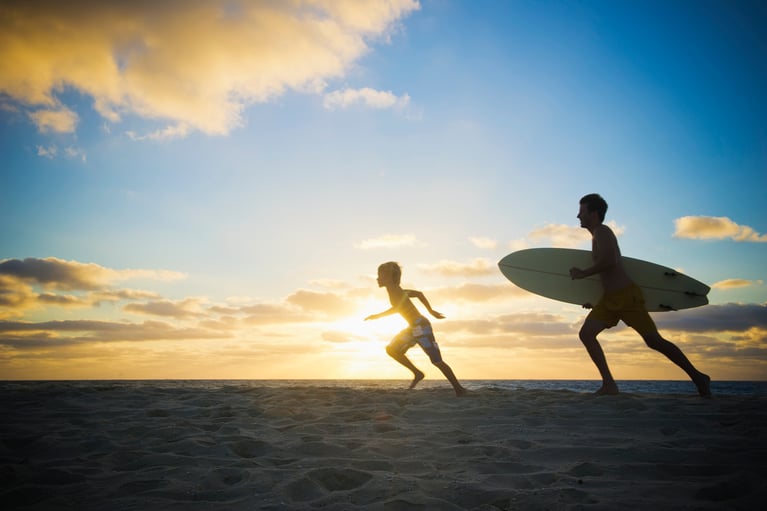 father_and_son_with_surfboard.jpg