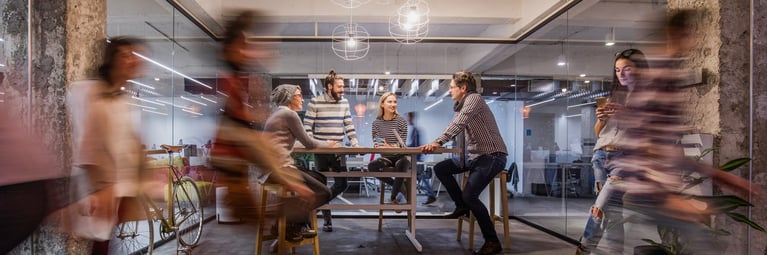 Business meeting behind walking colleagues 0