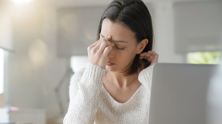 businesswoman having headache 1