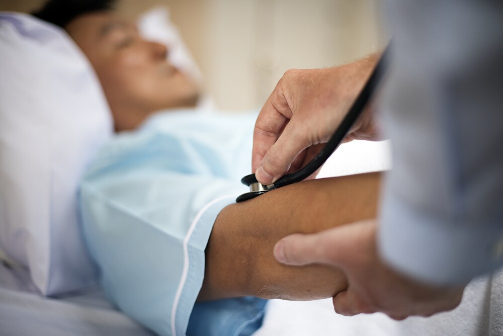 doctor-checking-patient.png