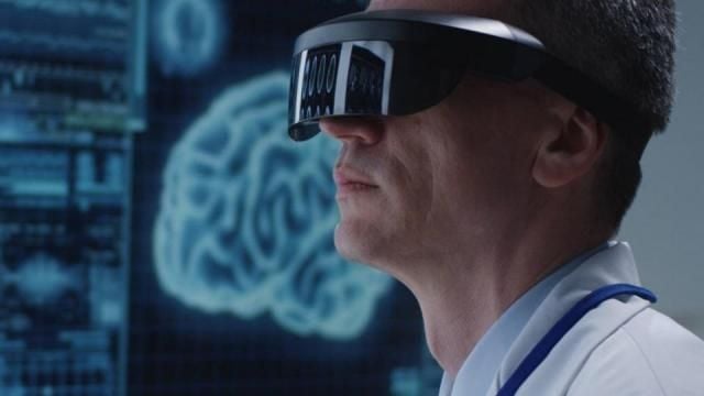 doctor-examining-brain-scans-with-vr-glasses-3-1-1.jpg
